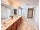 Bright bathroom featuring a double sink vanity and tile flooring at 4978 Arborview Pkwy, Acworth, GA 30101
