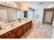 Bathroom featuring double sink vanity, garden tub and private commode at 4978 Arborview Pkwy, Acworth, GA 30101