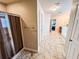 Bathroom with a glass shower door and tile flooring at 4978 Arborview Pkwy, Acworth, GA 30101