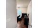 View of a bedroom with hardwood floors, ceiling fan, and a window at 4978 Arborview Pkwy, Acworth, GA 30101
