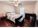 Bedroom featuring a ceiling fan, natural light, and wood floors at 4978 Arborview Pkwy, Acworth, GA 30101
