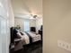 Comfortable bedroom with a ceiling fan and plenty of natural light at 4978 Arborview Pkwy, Acworth, GA 30101