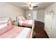 Comfortable bedroom with two twin beds, neutral walls, and dark wood flooring at 4978 Arborview Pkwy, Acworth, GA 30101