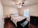Bedroom featuring a ceiling fan, natural light, and wood floors at 4978 Arborview Pkwy, Acworth, GA 30101