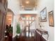 Grand foyer showcasing hardwood floors, a high ceiling, and an open staircase, creating a welcoming entrance at 4978 Arborview Pkwy, Acworth, GA 30101