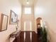 Open foyer features two story ceiling, decorative wall mirror and table with fresh flowers at 4978 Arborview Pkwy, Acworth, GA 30101