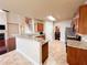 Kitchen featuring a breakfast bar, stainless steel appliances, and tile floors at 4978 Arborview Pkwy, Acworth, GA 30101