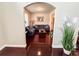 Cozy living room featuring hardwood floors, comfortable seating, and natural light streaming through the windows at 4978 Arborview Pkwy, Acworth, GA 30101