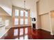 Bright living room with fireplace, ceiling fan, and large windows providing natural light at 4978 Arborview Pkwy, Acworth, GA 30101