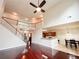 Open-concept living space with staircase to the second floor, dining room, and breakfast bar seating at 4978 Arborview Pkwy, Acworth, GA 30101