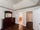 Bedroom featuring ensuite bathroom, walk-in closet, dark furniture and hardwood floors at 4978 Arborview Pkwy, Acworth, GA 30101