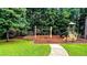 Neighborhood playground with a bench and mulch, perfect for safe, outdoor fun at 4978 Arborview Pkwy, Acworth, GA 30101