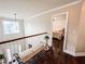 Upstairs landing featuring hardwood floors, window, and a bench seat at 4978 Arborview Pkwy, Acworth, GA 30101
