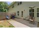 Backyard features a patio with grill, and a grassy lawn at 560 Vandenburg Dr, Villa Rica, GA 30180