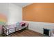 Cozy bedroom with a colorful accent wall and a comfortable bed at 560 Vandenburg Dr, Villa Rica, GA 30180