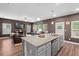 Open concept kitchen with granite countertops and views of the living area at 560 Vandenburg Dr, Villa Rica, GA 30180