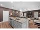 Spacious kitchen island with stainless steel appliances and gray cabinets at 560 Vandenburg Dr, Villa Rica, GA 30180