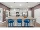 Charming kitchen with pendant lighting, modern appliances, and a large island at 560 Vandenburg Dr, Villa Rica, GA 30180