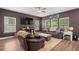 Comfortable living room with large windows and stylish furnishings at 560 Vandenburg Dr, Villa Rica, GA 30180