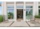 Welcoming front entrance featuring a modern door, large windows, and stylish decor that invites you into the home at 100 5Th St, Fayetteville, GA 30214