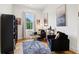 Home office space featuring a chess table, black armchairs, and stylish decor at 100 5Th St, Fayetteville, GA 30214