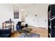 Stylish home office with unique decor, a chess table, and ample natural light at 100 5Th St, Fayetteville, GA 30214
