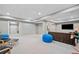 Finished basement with open layout, perfect for entertaining or relaxing at 1335 Joy Ct, Suwanee, GA 30024