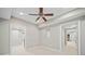 Open basement layout with neutral colors and ample natural light from the doors at 1335 Joy Ct, Suwanee, GA 30024