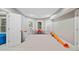 Bright basement featuring a dedicated play area and natural light at 1335 Joy Ct, Suwanee, GA 30024