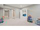Spacious basement with multiple doorways, offering versatility and storage at 1335 Joy Ct, Suwanee, GA 30024