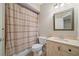 Bathroom with patterned shower curtain and vanity sink at 1335 Joy Ct, Suwanee, GA 30024
