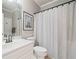 Well-maintained bathroom with a vanity, toilet, and shower with curtain at 1335 Joy Ct, Suwanee, GA 30024