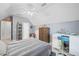 Cozy bedroom with sloped ceiling and neutral color palette at 1335 Joy Ct, Suwanee, GA 30024