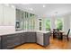 Stylish kitchen with quartz countertops, stainless steel appliances, and ample cabinet space at 1335 Joy Ct, Suwanee, GA 30024