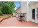 Enjoy outdoor living on this back deck with a swing overlooking the backyard at 1732 Winding Woods Ln, Jonesboro, GA 30236