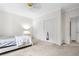 Neutral bedroom with double closets, light walls, and a cozy atmosphere at 1732 Winding Woods Ln, Jonesboro, GA 30236