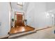 Inviting foyer with hardwood floors, a skylight, and an elegant front door at 1732 Winding Woods Ln, Jonesboro, GA 30236
