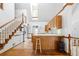Bright kitchen with wooden bar, stainless appliances, and ample cabinet space at 1732 Winding Woods Ln, Jonesboro, GA 30236