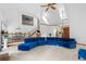Bright living area with a soaring ceiling, large windows, and elegant furnishings at 1732 Winding Woods Ln, Jonesboro, GA 30236