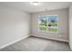 Bedroom with carpet floor, window and neutral walls at 176 Windy Cir, Mcdonough, GA 30253