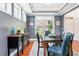 Elegant dining area featuring hardwood floors, natural light, and stylish decor at 2039 West Hampton Dr, Canton, GA 30115
