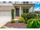 Charming front entrance with landscaped yard and covered porch at 2039 West Hampton Dr, Canton, GA 30115