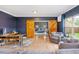 Modern living room with wood floors, barn doors, and cozy seating area at 2039 West Hampton Dr, Canton, GA 30115
