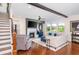 Bright living room with fireplace, large windows, and comfortable seating at 2039 West Hampton Dr, Canton, GA 30115
