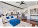 Open-concept living space with modern furnishings, hardwood floors and lots of light at 2039 West Hampton Dr, Canton, GA 30115