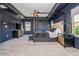 This main bedroom features a tray ceiling, four-poster bed, and an ensuite bath at 2039 West Hampton Dr, Canton, GA 30115