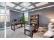 Well-appointed office with coffered ceilings, ample natural light, and comfortable seating area at 2039 West Hampton Dr, Canton, GA 30115