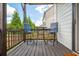 Cozy patio area with two chairs, table, and a view of a neighboring house at 2039 West Hampton Dr, Canton, GA 30115