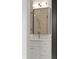 Bathroom featuring modern vanity, stylish mirror, and designer patterned backsplash at 2335 Mason Dr # D27, Atlanta, GA 30316