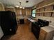 Galley kitchen with wood cabinets and appliances at 2612 Ramblewood Ct, Acworth, GA 30102